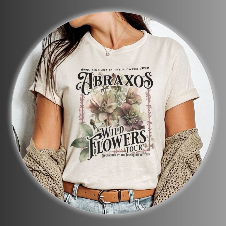 Girl wearing a t-shirt with 'Abraxas Wild Flowers Tour' design