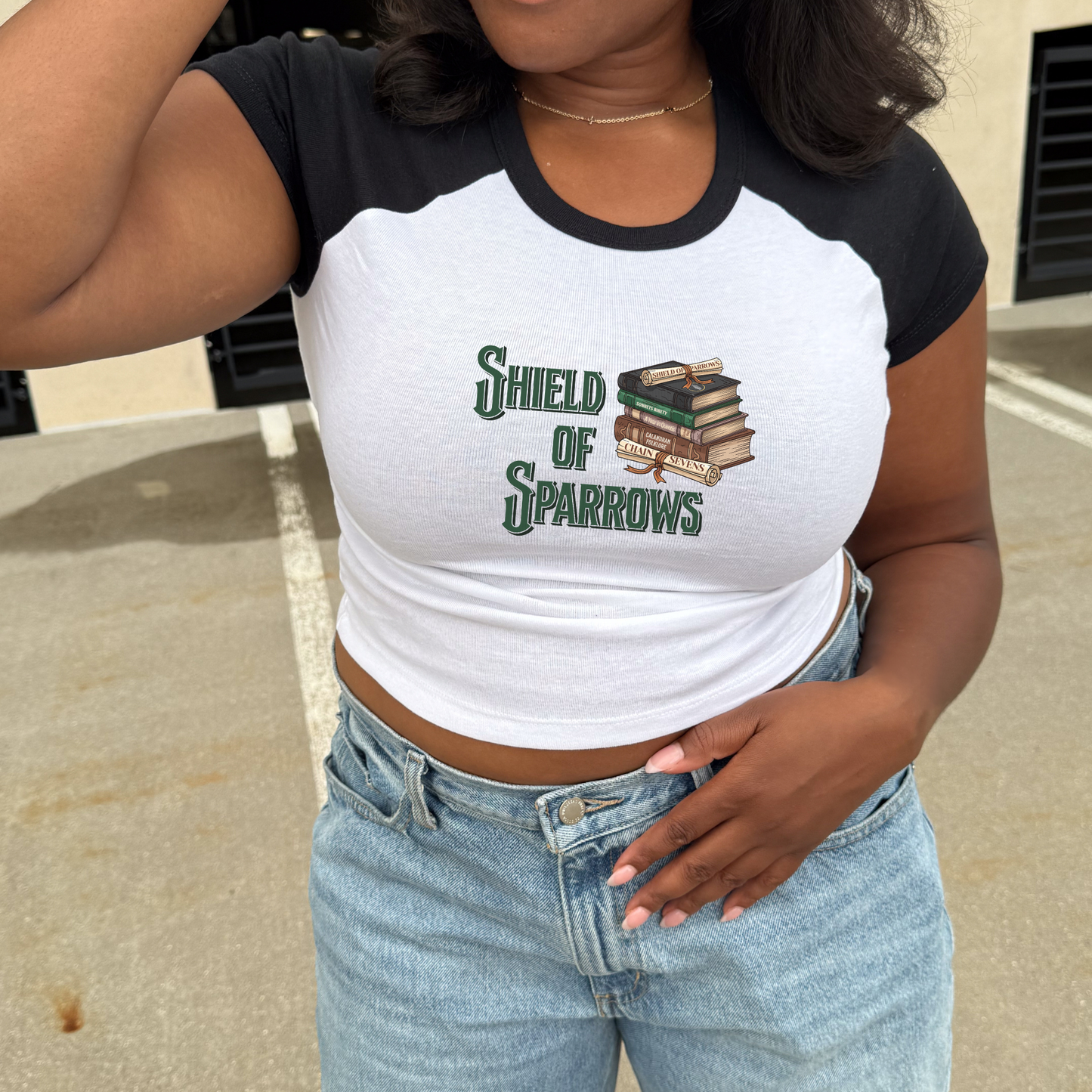 Books & Treaties | Shield of Sparrows Baby Tee