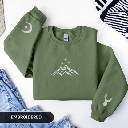 Green sweatshirt with embroidered designs